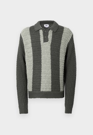 Knitted polo sweater in gray and light green with a textured pattern. Features a collar and three buttons, ribbed cuffs and hem.