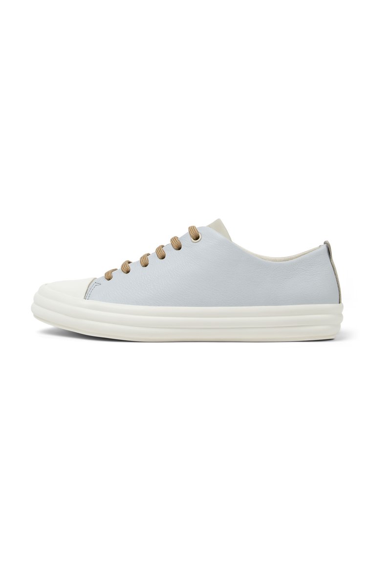 Light blue leather sneakers with beige laces, a rounded toe, and a thick white sole; features a smooth texture and minimalistic design.