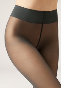 Przezroczyste czarne rajstopy z szerokim, gładkim pasem i bezszwowym wzornictwem, które sięga od talii do uda, ukazując przejrzysty efekt.