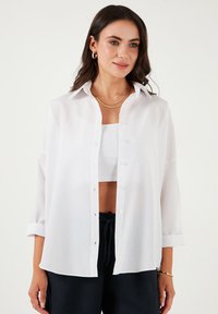 Blusa - white