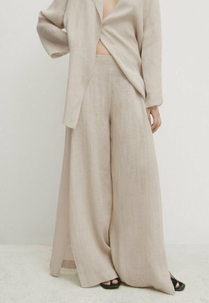 Trousers - beige
