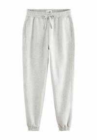 Lichtgrijze sweatpants van zachte stof met een elastische tailleband, trekkoord, zijzakken en taps toelopende boorden bij de enkels.
