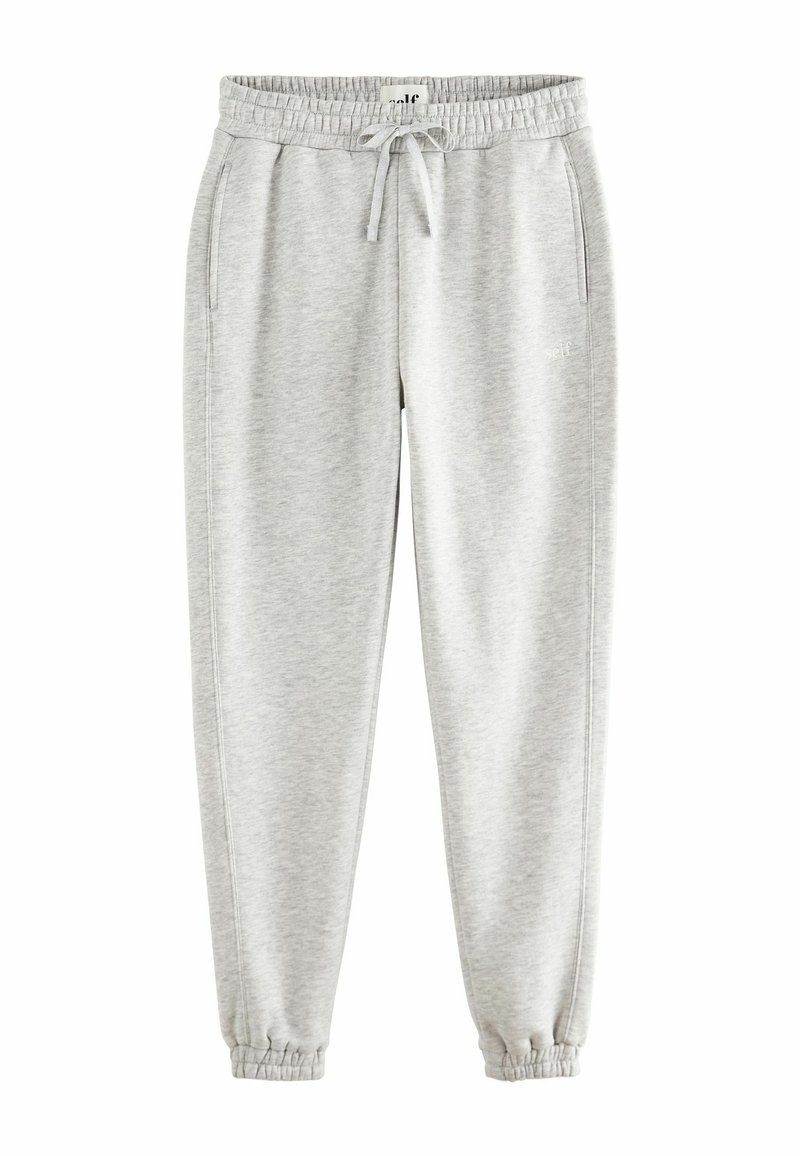 Lichtgrijze sweatpants van zachte stof met een elastische tailleband, trekkoord, zijzakken en taps toelopende boorden bij de enkels.