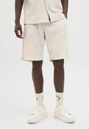 Pantalones deportivos - off-white