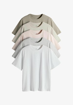 Five plain crewneck t-shirts in white, light gray, light pink, beige, and olive green, stacked in a fan arrangement.