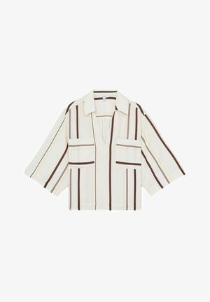 Kreemivärviline lühikeste varrukatega särk, millel on pruunid ja kollased vertikaalsed triibud, kaks esist taskut ja V-kujuline kaelus.