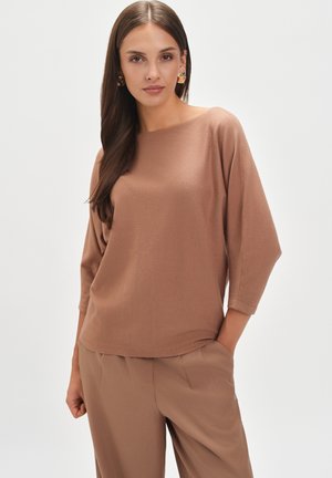 - Sweter