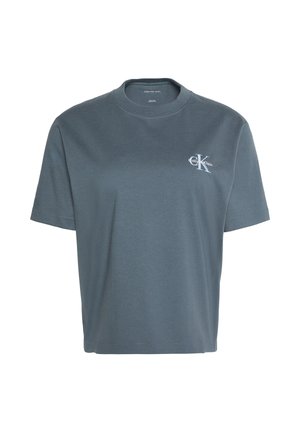 T-shirt Calvin Klein gris foncé à manches courtes avec col rond et petit logo blanc CK sur la poitrine gauche.