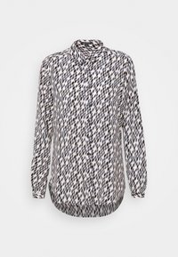 Chemise à manches longues avec boutons, en tissu léger, présentant un motif de losanges alternés foncés et clairs en bleu marine et beige.