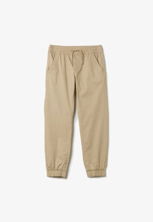 Beige Jogginghosen aus weicher Baumwolle, mit einem elastischen Taillenbund und Kordelzug, Seitentaschen und elastischen Bündchen an den Knöcheln.
