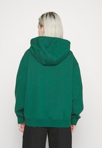 adidas Originals CLASSICS OVERSIZED HOODIE - Sweatshirt - dark green