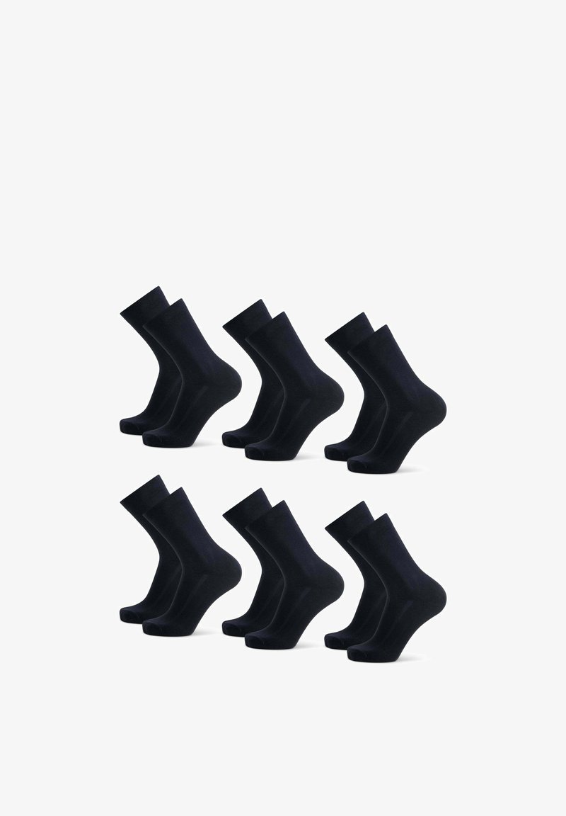 Svarta bomullssockor arrangerade i två rader. Varje socka har en slät yta och standard knähöjd med ribbat topp.