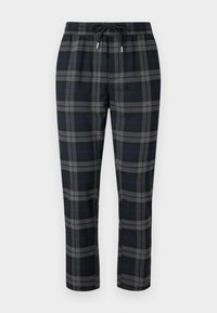Zwarte en grijze geruite loungeschoenen met een elastische tailleband en een trekkoord. Rechtermanslijn en zachte stoftextuur.