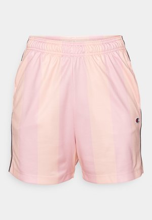 Lys rosa treningsshorts med vertikale striper, elastisk linning og sideaksenter i svart. Har en liten logo nede til venstre.