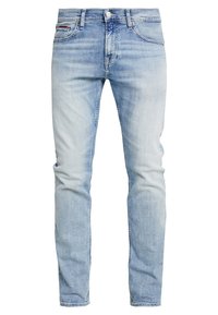 Ljusblå slim-fit denimjeans med lätt urblekning, fem fickor och bältesöglor, visade framifrån mot en vit bakgrund.