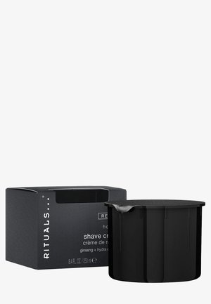 Sort krukke med barbercreme med et struktureret låg ved siden af en sort æske med hvid tekst og et klart vindue. Indeholder 250 ml.