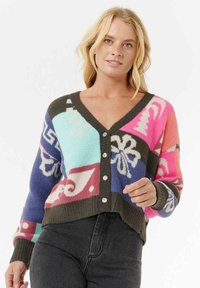 Bunter, gemusterter Cardigan mit V-Ausschnitt, Knöpfen vorne und langen Ärmeln. Verfügt über mehrere Farben: Pink, Hellblau, Dunkelblau und Braun.