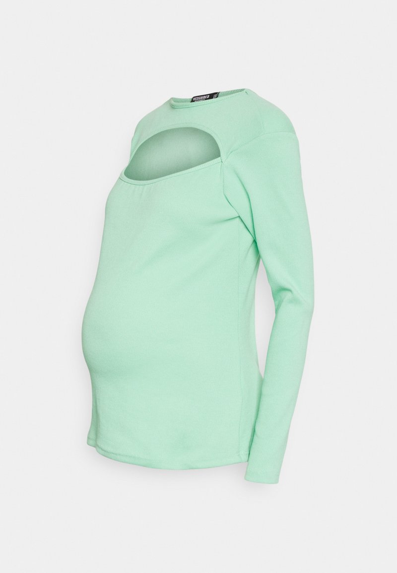 Blusa de maternidade de mangas longas em verde menta, com um decote redondo, contendo um recorte abaixo do decote e um design justo para conforto.