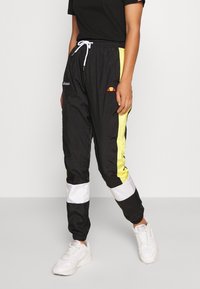 Ellesse Tracksuit bottoms - black