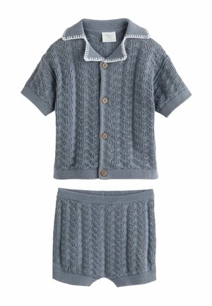 Blue knitted baby outfit with short-sleeve button-up cardigan and matching shorts, featuring textured cable knit pattern.