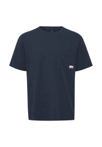 Navy blue cotton t-shirt with a round neck, short sleeves, and a chest pocket. Features a small label on the pocket. Soft texture.