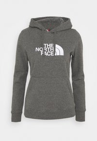Felpa con cappuccio grigia realizzata in un materiale morbido, caratterizzata da un grande logo bianco sul davanti e una tasca a marsupio frontale.