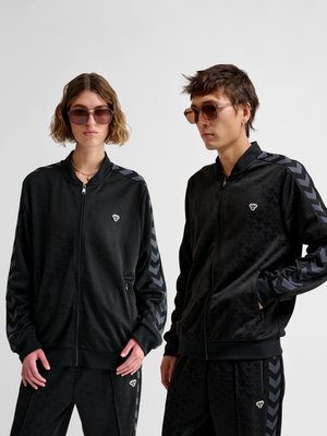 Hummel ARCHIVE REGULAR JACKET - Sportinė striukė - black/ebony