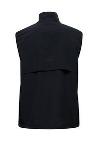 Czarna bezrękawnik wykonany z gładkiego, lekkiego materiału. Wysoki kołnierz, z tyłu znajduje się klapa z napisem marki 'OFF DUTY GEAR'. Prosty design.