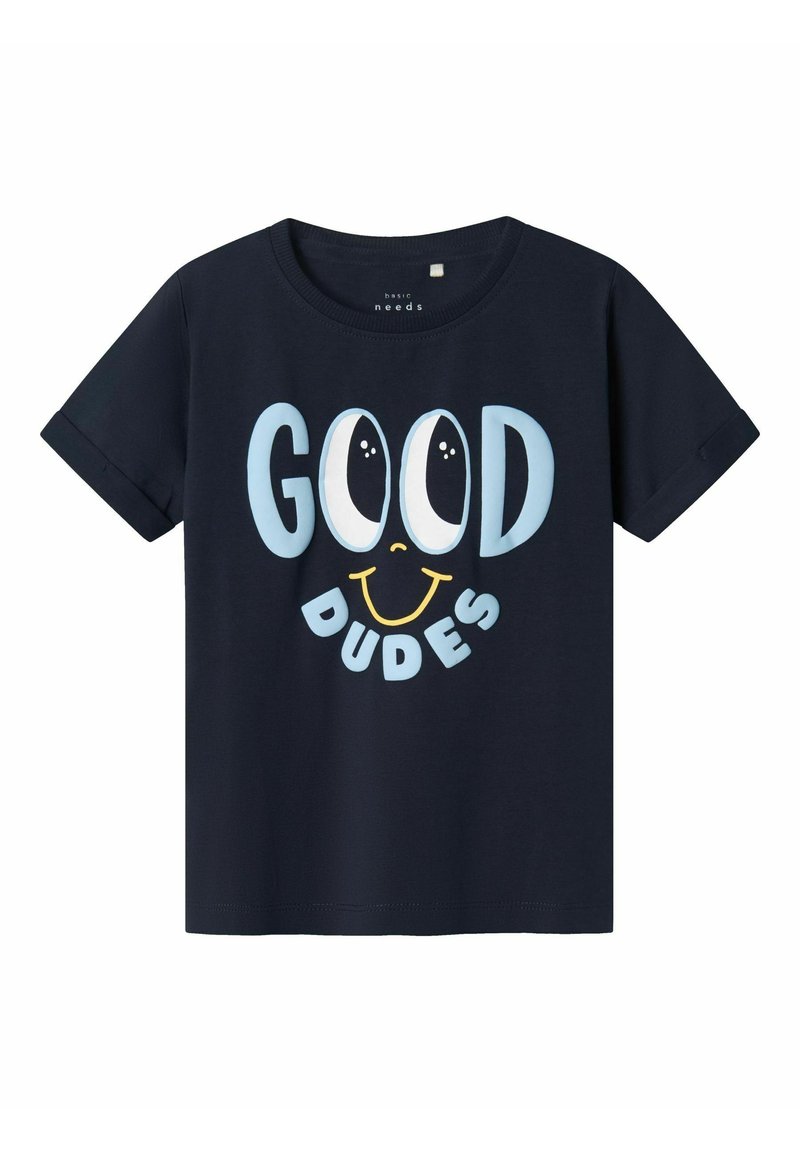 Camiseta de manga corta azul marino con el texto "GOOD DUDES" en azul claro y blanco, acompañada de un gráfico de una cara sonriente. Material de algodón.