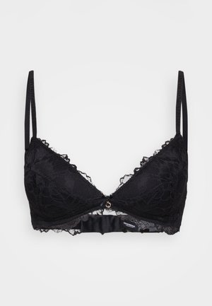 Brassière en dentelle noire avec un motif floral, bretelles ajustables, un accent central en argent et des bords cannelés. Texture douce et semi-transparente.