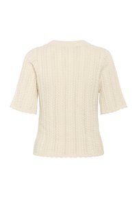 Pull en tricot de couleur crème avec des manches courtes, présentant une texture côtelée et un ourlet festonné. Le dos affiche un motif vertical ouvert.