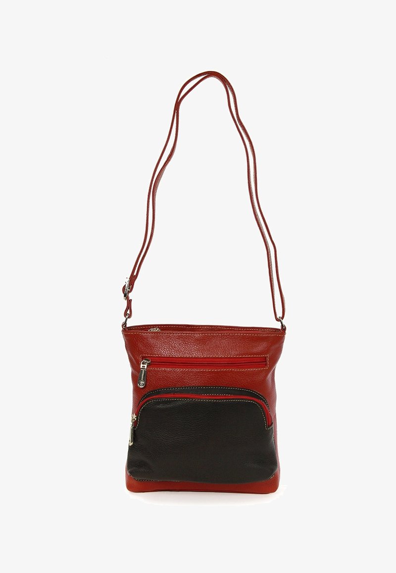 Red and black leather crossbody bag with two zippered pockets, adjustable strap, smooth texture, and contrasting colors.