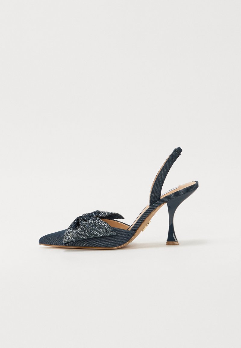 Mornarsko slingback peto z ostrim nosom, teksturirano blago in pentljo na vampu. Ima stiletto peto in gladko podplato.
