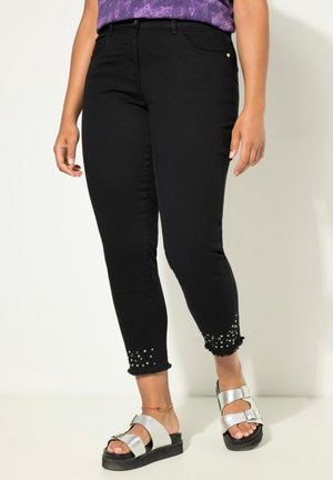 - Jeansy damskie mom fit