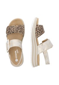 Beige open-toe sandals with leopard print upper, metallic gold accents, adjustable buckle, cushioned footbed, and lightweight white sole.