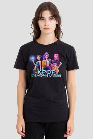 Young woman wearing black T-shirt featuring three animated K-pop characters and text "KPOP DEMON HUNTERS" on front.