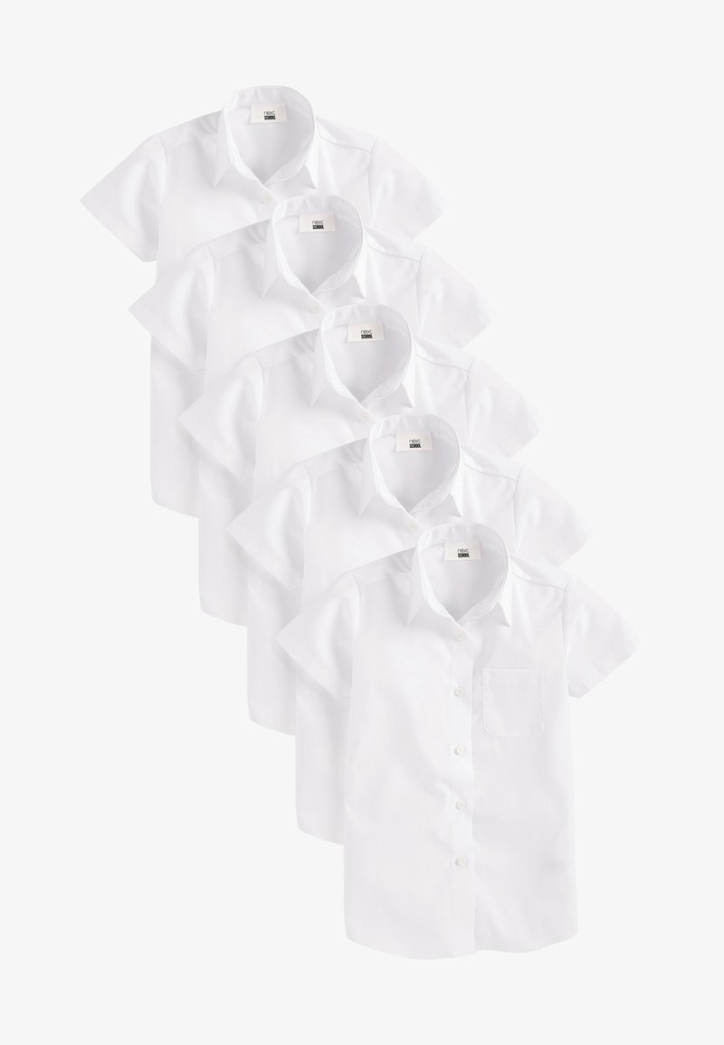 Short-sleeve white shirts made of cotton, featuring a button-down front, a collar, and a pocket on the left side. Five shirts stacked.