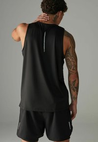 Next Top - black