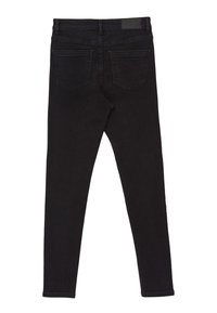 Jean skinny noirs en denim, avec une texture lisse, une taille standard et deux poches arrière au design classique.