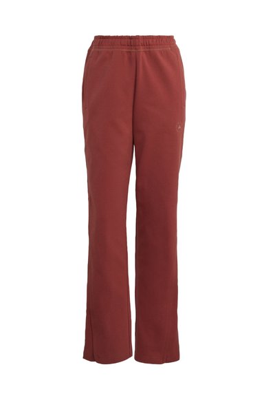 Bordeauxrode joggingbroek met een losse pasvorm, elastische tailleband en subtiel logodetail. Gemaakt van zachte, gestructureerde stof, met rechte pijpopeningen.