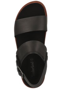 Sandale en cuir noir avec des sangles larges, détail de boucle et semelle extérieure marron. Texture lisse, design ouvert pour la respirabilité et le confort.