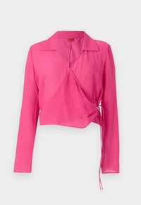 Pink wrap blouse with long sleeves, collar, textured fabric, and adjustable side ties for fit. Features a deep V-neck and cropped length.