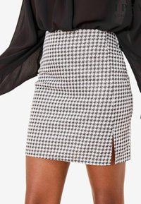 Niet geselecteerd, dogtooth check