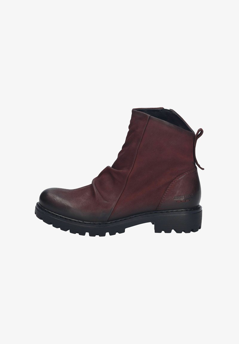 Botín de cuero burdeos con punta redonda, cierre de cremallera lateral, superficie texturizada y suela de goma negra resistente.