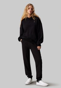 Calvin Klein Jeans Pantalones deportivos - ck black