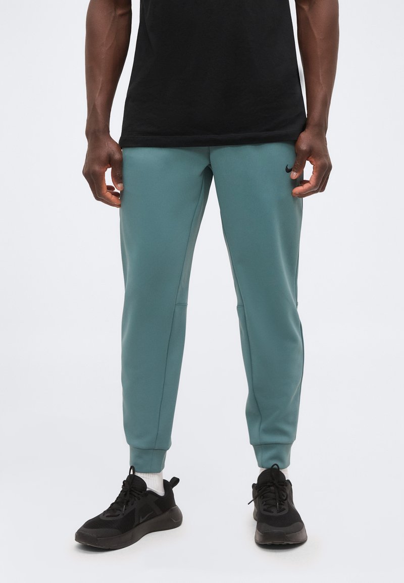 Nike Performance FLEX JOGGER - Teplákové kalhoty - mineral slate/black