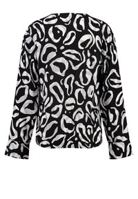 Langærmet top i sort med hvid abstrakt leopardmønster. Letvægtsstof med en afslappet pasform og rund halsudskæring. Glat tekstur.
