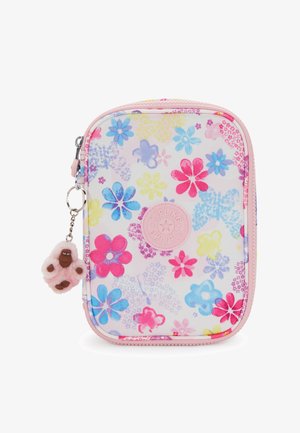 Kleine Pastell-gestreifte Tasche mit Reißverschluss, Blumenmuster, rundem Kipling-Logo und einem rosa pelzigen Affen-Schlüsselanhänger.