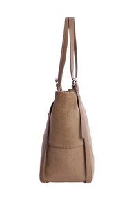 Bolso de ante color marrón claro con asas dobles, forma ligeramente cónica, detalles de costura y un bolsillo lateral. Textura suave, diseño minimalista.