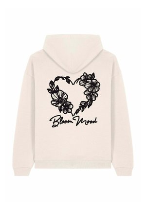 Felpa con cappuccio in beige chiaro, con un design a cuore floreale nero e testo in corsivo "Bloom Mood" sul retro. Tessuto morbido, vestibilità casual.